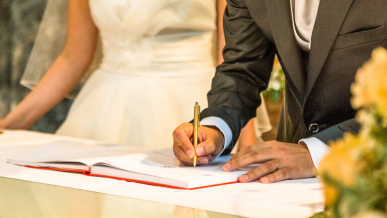Groom sign on registration of marriage